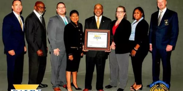 Group photo of SCDPPPS representatives receiving the CALEA certificate.