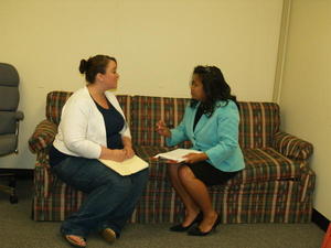 Staff member counseling a victim